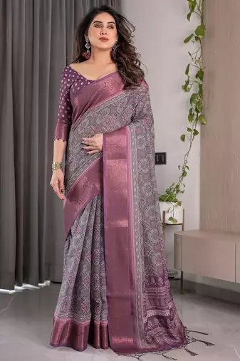 Graceful handloom linen weaved with golden zari saree with artistic floral print & tassels