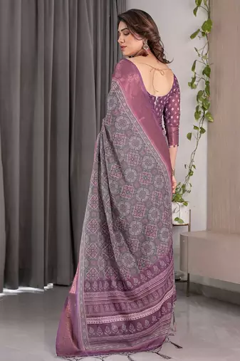 Graceful handloom linen weaved with golden zari saree with artistic floral print & tassels