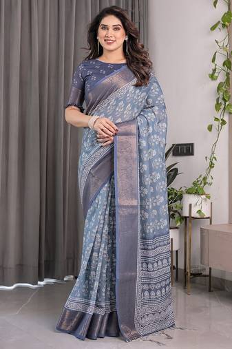 Designer floral print handloom linen weaved with golden zari saree with tassel pallu & blouse