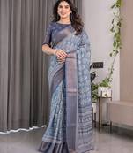 Designer floral print handloom linen weaved with golden zari saree with tassel pallu & blouse