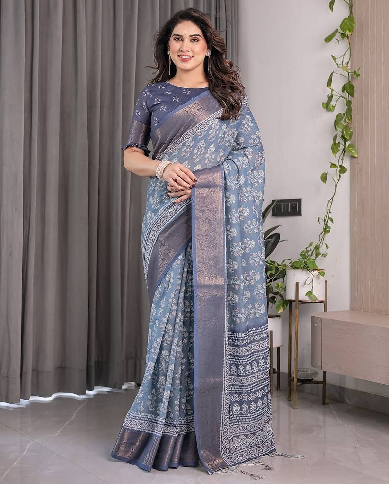 Designer floral print handloom linen weaved with golden zari saree with tassel pallu & blouse