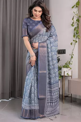 Designer floral print handloom linen weaved with golden zari saree with tassel pallu & blouse