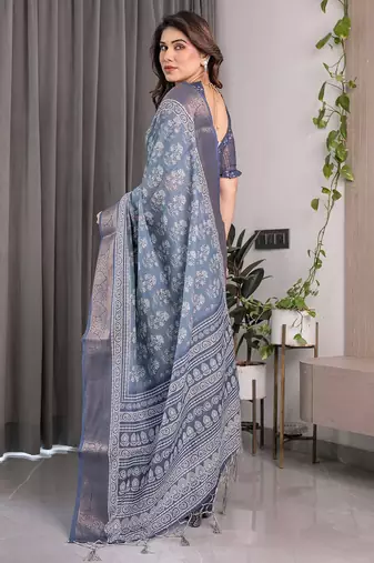 Designer floral print handloom linen weaved with golden zari saree with tassel pallu & blouse