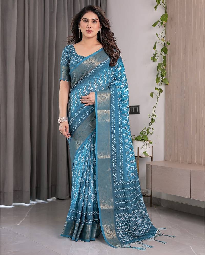 Linen weaved with golden zari handloom saree with digital floral print and tassels     festive wear