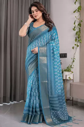 Linen weaved with golden zari handloom saree with digital floral print and tassels     festive wear