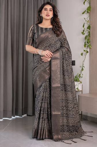 Pastel floral handloom linen weaved with golden zari saree with pallu tassels & blouse piece