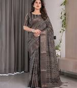 Pastel floral handloom linen weaved with golden zari saree with pallu tassels & blouse piece