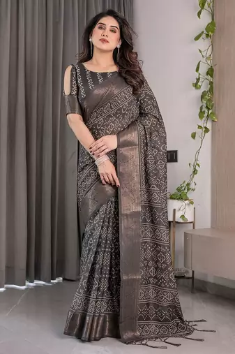 Pastel floral handloom linen weaved with golden zari saree with pallu tassels & blouse piece