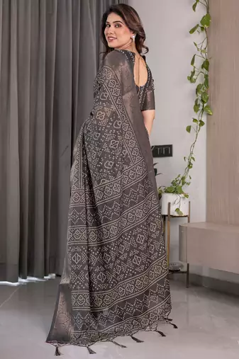 Pastel floral handloom linen weaved with golden zari saree with pallu tassels & blouse piece