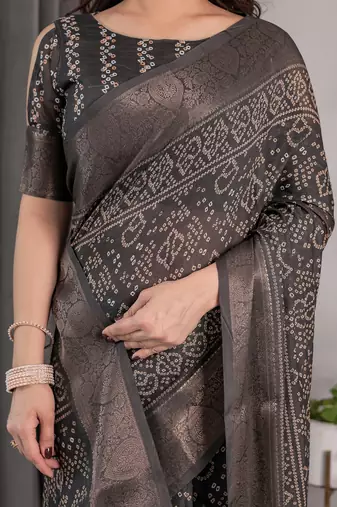 Pastel floral handloom linen weaved with golden zari saree with pallu tassels & blouse piece