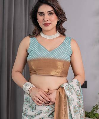 Soft handloom linen weaved with golden zari saree with multicolor floral print and tassel edges 5