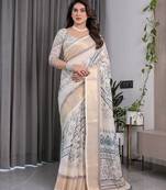 Stylish linen weaved with golden zari handloom saree with floral digital print and tassels     5.5m + 0.8m