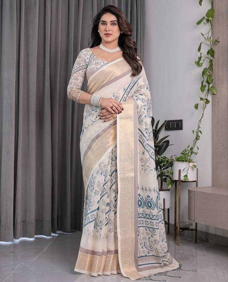 Stylish linen weaved with golden zari handloom saree with floral digital print and tassels     5.5m + 0.8m