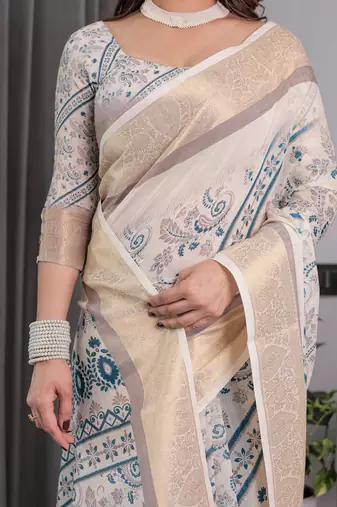 Stylish linen weaved with golden zari handloom saree with floral digital print and tassels     5.5m + 0.8m
