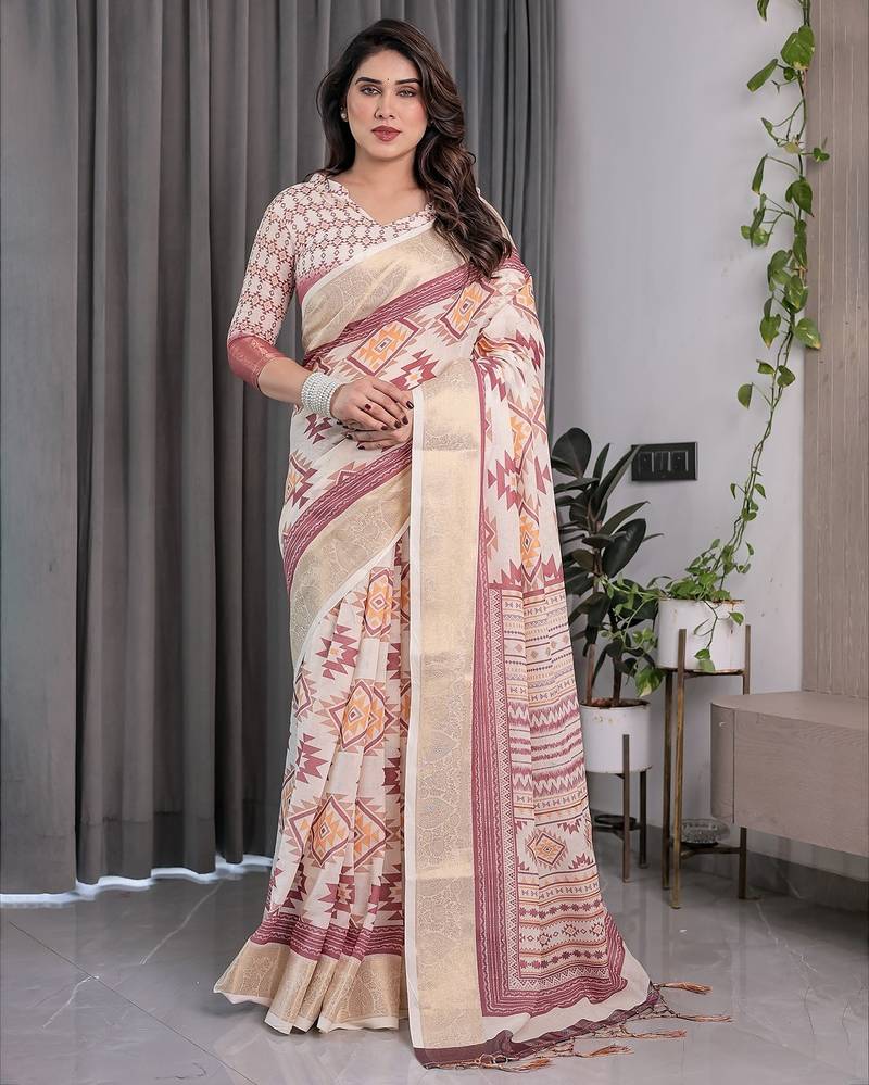 Handloom linen weaved with golden zari floral printed saree with tassels & attached blouse     5.5m