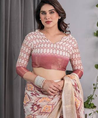 Handloom linen weaved with golden zari floral printed saree with tassels & attached blouse     5.5m 4