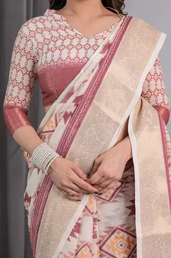 Handloom linen weaved with golden zari floral printed saree with tassels & attached blouse     5.5m