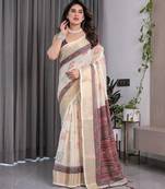 Elegant handloom linen weaved with golden zari saree with floral print & tassel edges     5.5m + 0.8m blouse