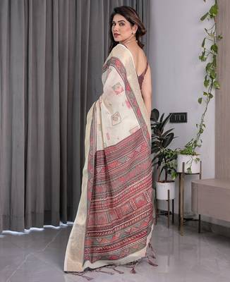 Elegant handloom linen weaved with golden zari saree with floral print & tassel edges     5.5m + 0.8m blouse 3