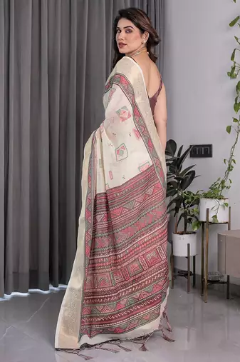 Elegant handloom linen weaved with golden zari saree with floral print & tassel edges     5.5m + 0.8m blouse