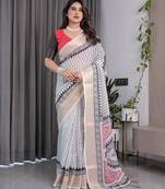Pure linen weaved with golden zari handloom saree with floral print and designer tassels