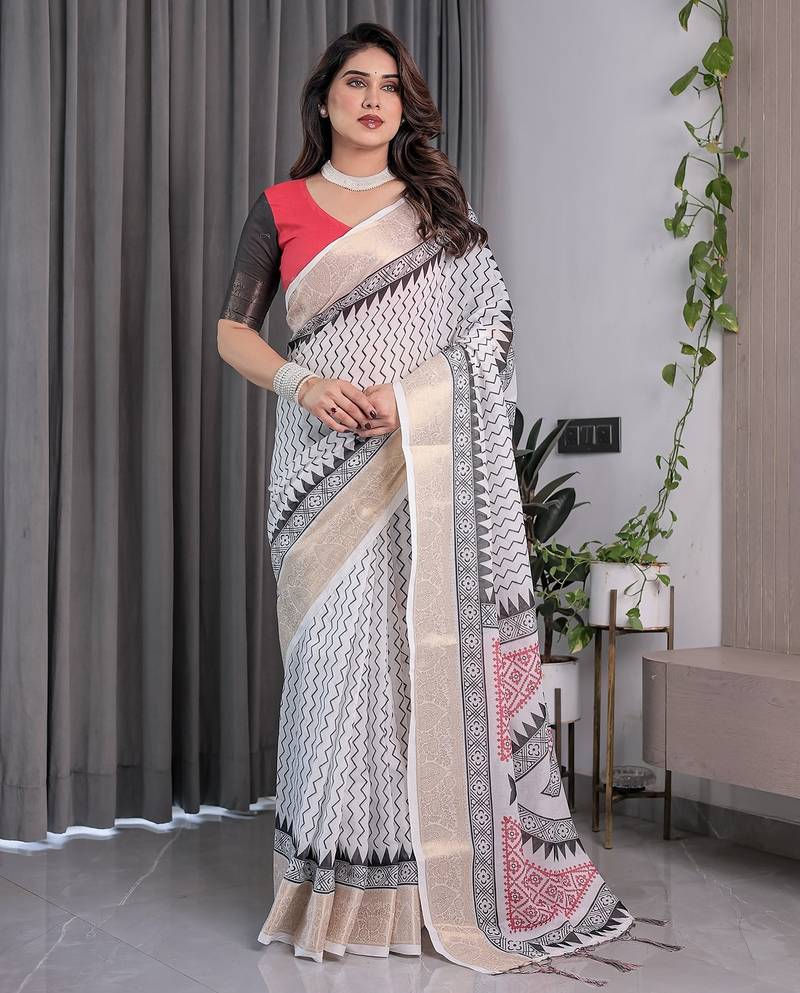 Pure linen weaved with golden zari handloom saree with floral print and designer tassels