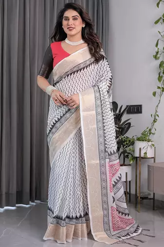 Pure linen weaved with golden zari handloom saree with floral print and designer tassels