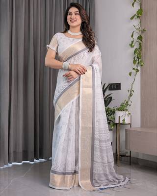 Floral printed linen weaved with golden zari saree in handloom weave with blouse piece     5.5m 2