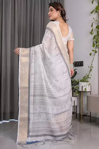 Floral printed linen weaved with golden zari saree in handloom weave with blouse piece     5.5m