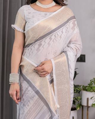 Floral printed linen weaved with golden zari saree in handloom weave with blouse piece     5.5m 5