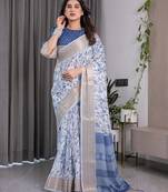 Traditional handloom linen weaved with golden zari floral saree with matching blouse & tassel detailing