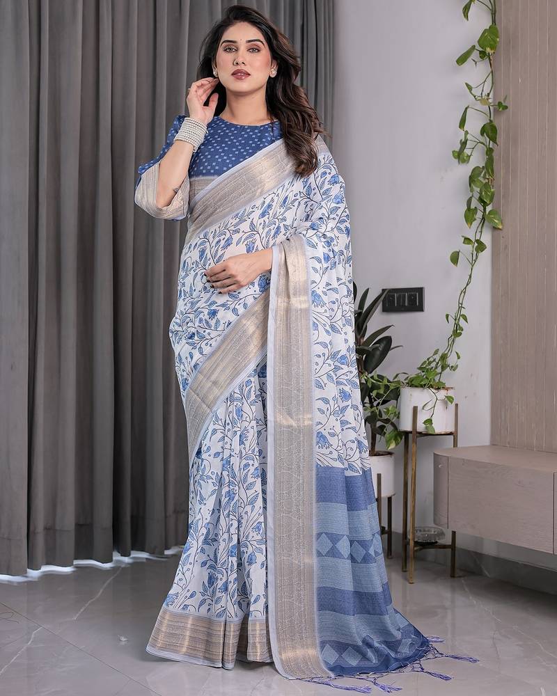 Traditional handloom linen weaved with golden zari floral saree with matching blouse & tassel detailing