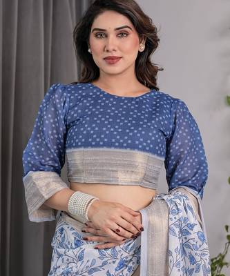 Traditional handloom linen weaved with golden zari floral saree with matching blouse & tassel detailing 4