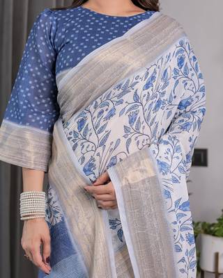 Traditional handloom linen weaved with golden zari floral saree with matching blouse & tassel detailing 5