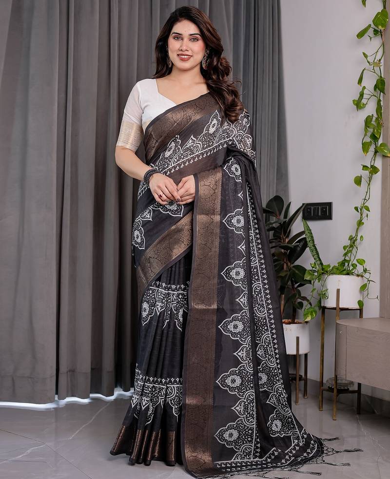 Soft handloom linen weaved with golden zari floral saree with tassels     includes 0.8m blouse