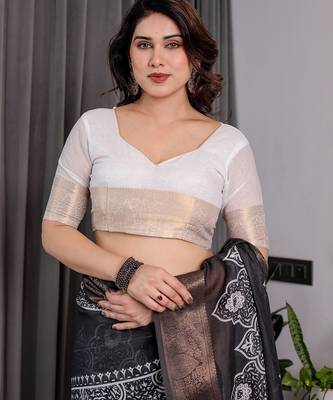 Soft handloom linen weaved with golden zari floral saree with tassels     includes 0.8m blouse 5