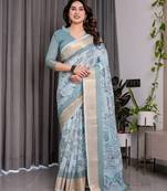 Printed floral handloom linen weaved with golden zari saree with stylish tassel finish     ready to wear