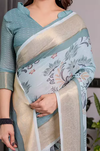 Printed floral handloom linen weaved with golden zari saree with stylish tassel finish     ready to wear