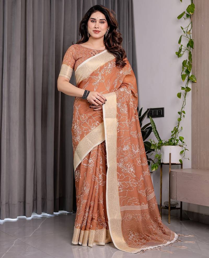Graceful handloom linen weaved with golden zari saree with artistic floral print & tassels