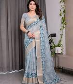 Linen weaved with golden zari handloom saree with digital floral print and tassels     festive wear