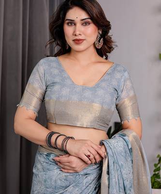 Linen weaved with golden zari handloom saree with digital floral print and tassels     festive wear 4