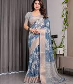 Pastel floral handloom linen weaved with golden zari saree with pallu tassels & blouse piece