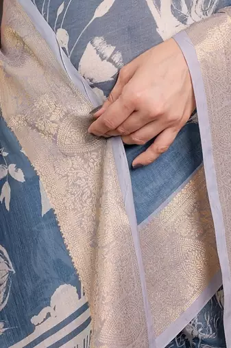 Pastel floral handloom linen weaved with golden zari saree with pallu tassels & blouse piece