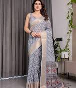 Ethnic handloom linen weaved with golden zari saree with colorful floral print and matching blouse
