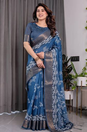 Soft handloom linen weaved with golden zari saree with multicolor floral print and tassel edges