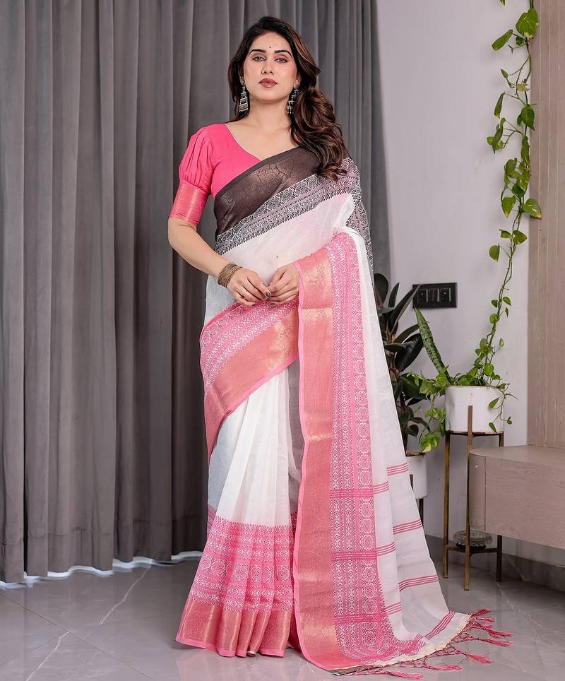 Stylish linen weaved with golden zari handloom saree with floral digital print and tassels     5.5m + 0.8m