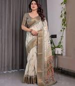 Handloom linen weaved with golden zari floral printed saree with tassels & attached blouse     5.5m
