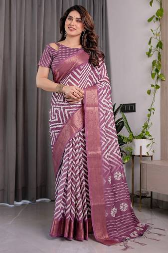 Pure linen weaved with golden zari handloom saree with floral print and designer tassels