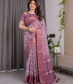 Pure linen weaved with golden zari handloom saree with floral print and designer tassels