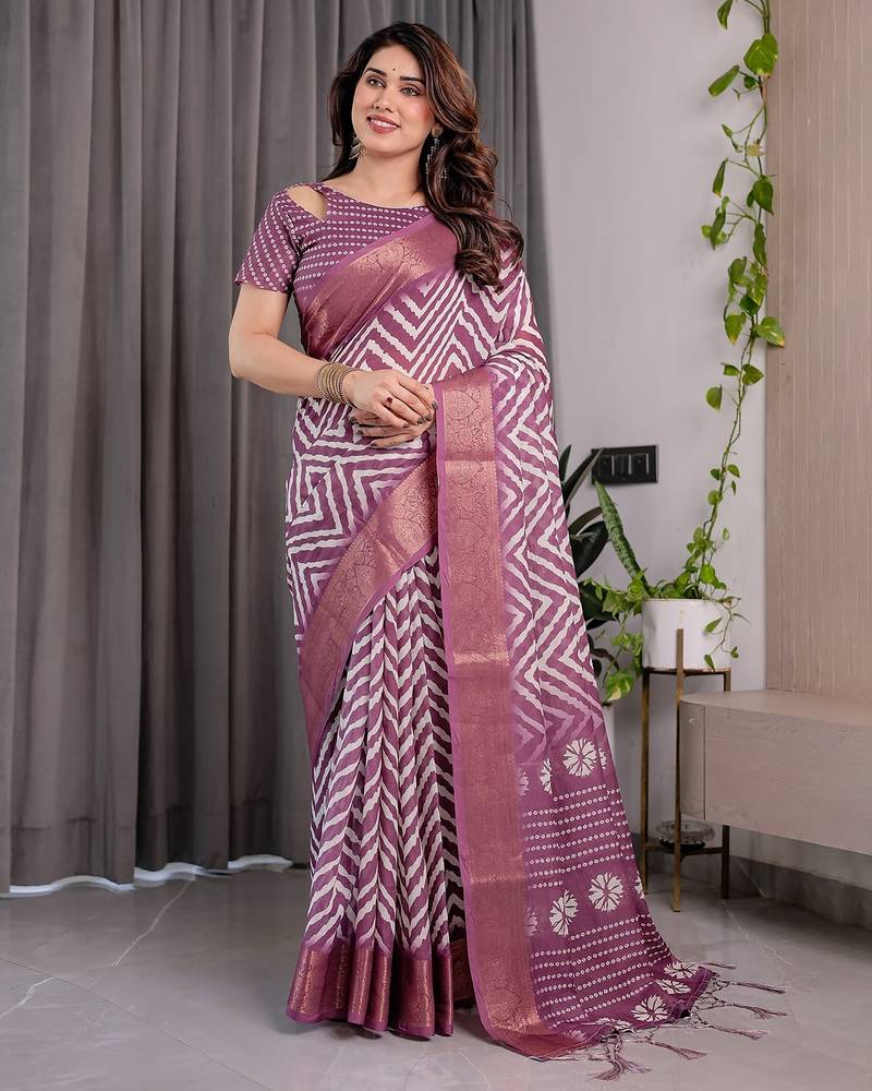 Pure linen weaved with golden zari handloom saree with floral print and designer tassels